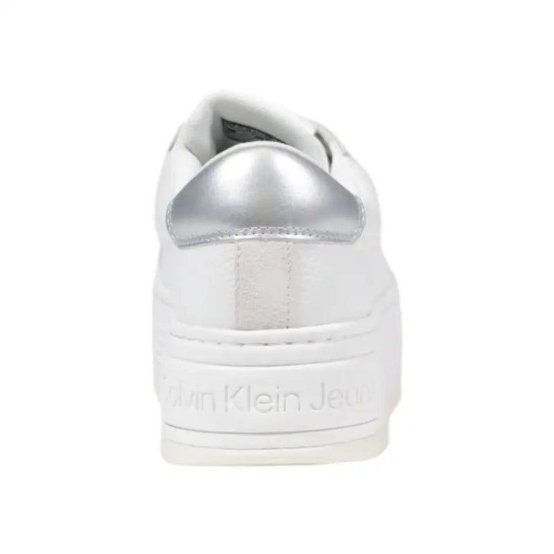 Calvin Klein Jeans women’s white platform sneakers with metallic silver heel tab and textured suede accents