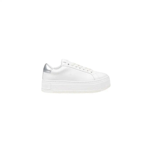 Calvin Klein Jeans women’s white leather platform sneaker with sleek minimalist design and metallic silver heel tab