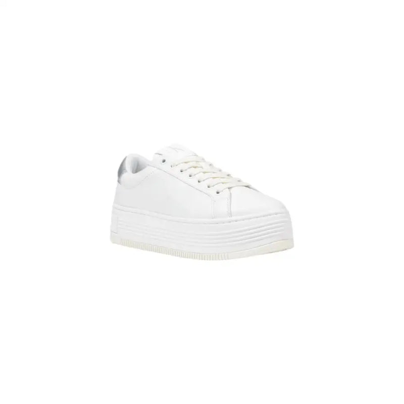 Calvin Klein Jeans women’s white leather platform sneaker with sleek minimalist design and subtle silver heel accent
