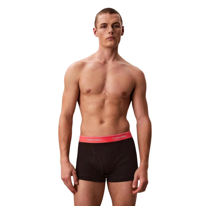 Calvin Klein men black cotton boxer briefs with red waistband featuring white brand logo in a 3 pack set