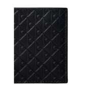 Calvin Klein men black leather wallet with quilted diamond pattern and embossed circular motifs 11 x 9.5 cm