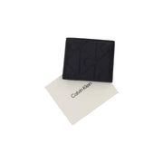 Calvin Klein men black leather zip wallet with embossed logo pattern in size W2 x H9 x L2 cm
