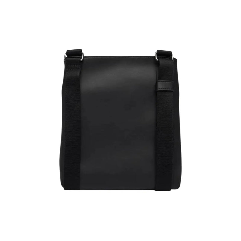 Calvin Klein Sac bandoulière homme en polyuréthane noir, au design minimaliste et élégant, avec bandoulière robuste (19 x 21 x 4 cm).