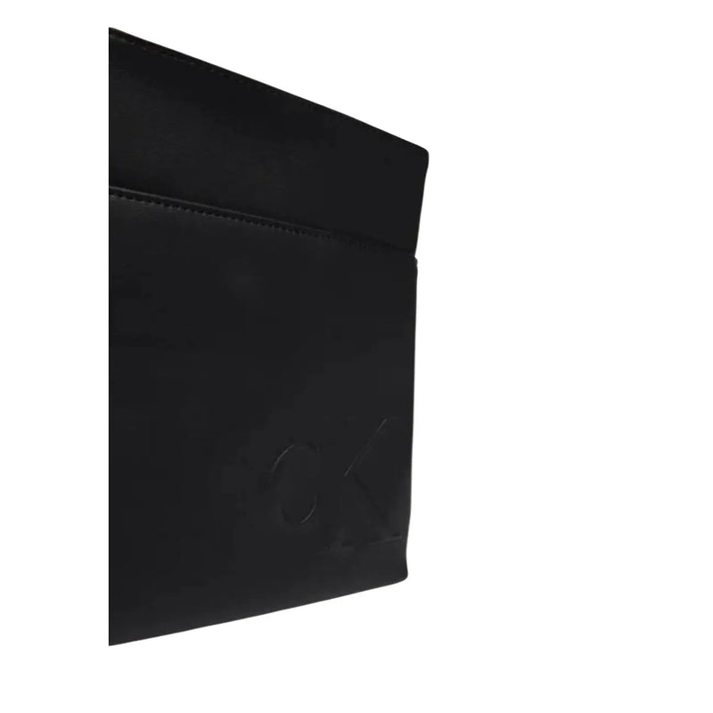 Portefeuille en cuir noir avec logo en relief assorti au sac bandoulière Calvin Klein pour homme en polyuréthane noir 19x21x4