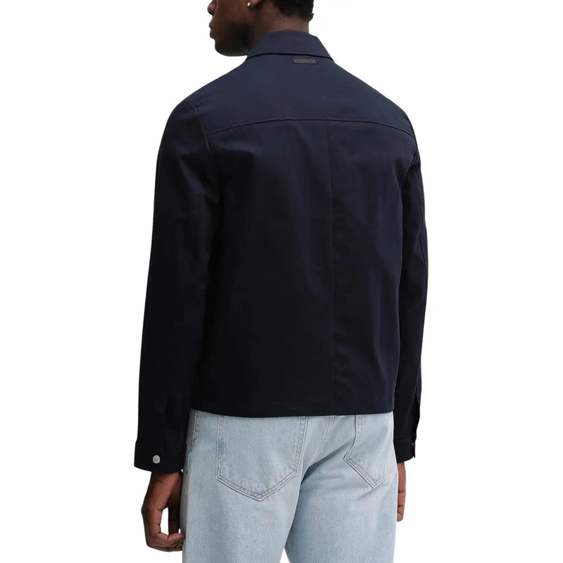 Dark navy blue cotton Calvin Klein men zip blazer with structured collar and subtle seam detailing classic fit