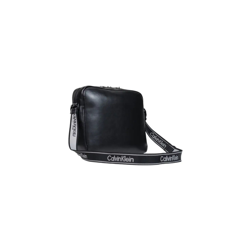 Calvin Klein Sacoche pour ordinateur portable homme 35 cm en toile noire avec logo audacieux, finition cuir mat élégant et bandoulière estampillée du logo.