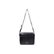 Calvin Klein Sac bandoulière noir pour ordinateur portable homme, orné d'un logo audacieux, au design minimaliste et élégant, et arborant le logo signature sur le devant.