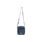 Sac bandoulière Calvin Klein pour homme, bleu foncé, logo discret et bandoulière ajustable, largeur 18 cm.