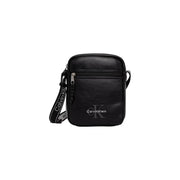 Calvin Klein Sacoche homme en toile bleue avec logo audacieux, design minimaliste élégant et logo discret sur le devant