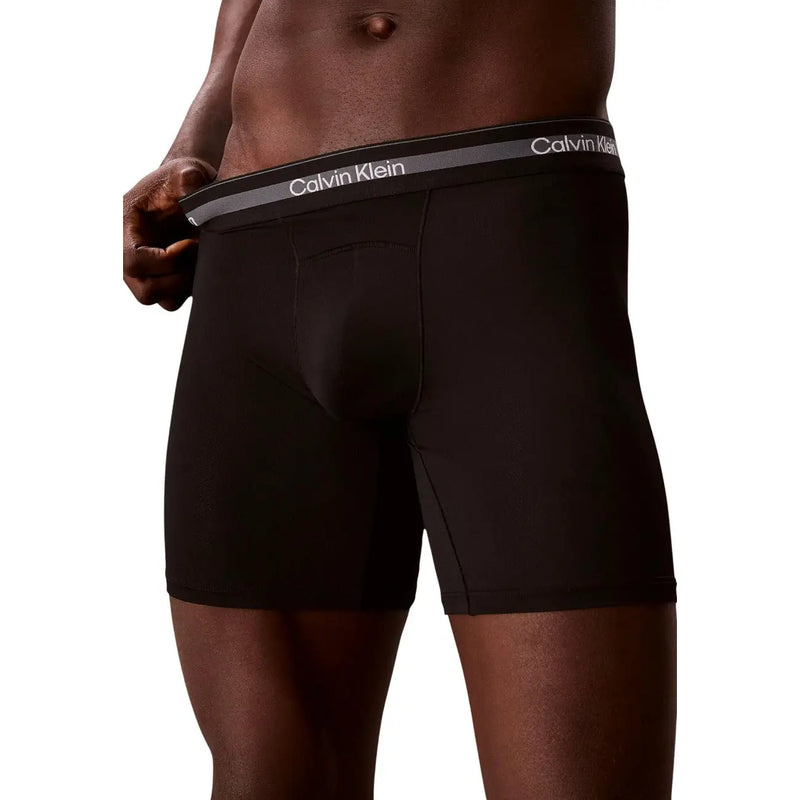 Calvin Klein men boxer briefs black polyester with gray waistband and white logo in 3 pack for comfortable wear