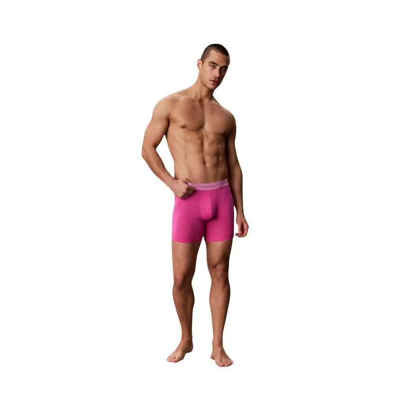 Bright pink Calvin Klein men boxer briefs with matching waistband made of cotton in a 5 pack set