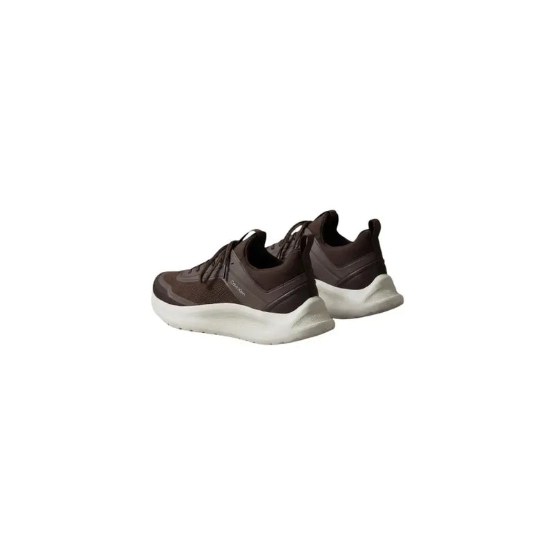 Baskets Skechers marron pour homme, 100 % polyester, à lacets, avec semelle en caoutchouc blanc et tige en mesh.