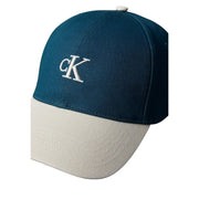 Casquette homme Calvin Klein verte bicolore bleu sarcelle foncé et blanc cassé, 100 % coton, logo CK brodé blanc, taille unique
