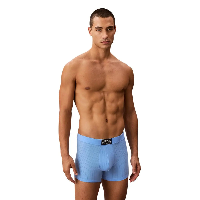 Light blue ribbed cotton boxer briefs with black Calvin Klein brand label at the waistband for men
