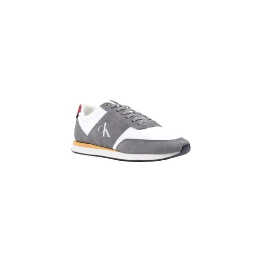 Calvin Klein Baskets homme grises en similicuir avec empiècements en daim, languette arrière rouge et semelle intermédiaire beige, pointure 38, automne-hiver