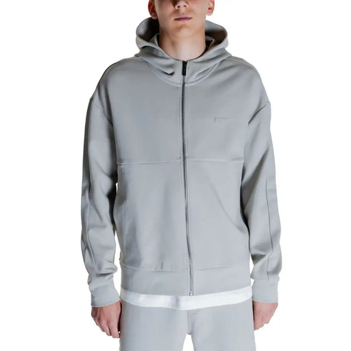Men’s light grey Calvin Klein full-zip hooded sweatshirt displayed for sale