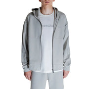 Men’s light grey Calvin Klein full-zip hooded sweatshirt paired with matching sweatpants