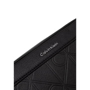 cuir noir texturé Calvin Klein Sac bandoulière homme avec logo en relief, dimensions L16 x H22 cm