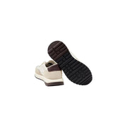 Calvin Klein Baskets en cuir pour homme, coloris crème et marron, avec semelle en caoutchouc texturé et fermeture à lacets.