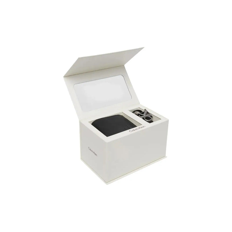 Calvin Klein Portefeuille en cuir pour homme et ceinture noire assortie, présentés dans un élégant coffret blanc de 11 x 9 cm.