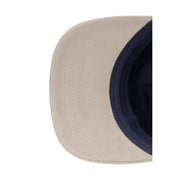 Casquette snapback en coton beige et bleu marine avec visière incurvée de Calvin Klein collection homme en techniques mixtes et blocs de couleur