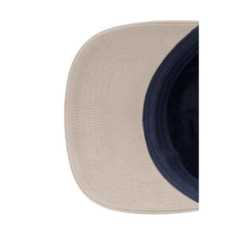 Casquette snapback en coton beige et bleu marine avec visière incurvée de Calvin Klein collection homme en techniques mixtes et blocs de couleur