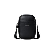 Sac bandoulière Calvin Klein pour homme, noir, en cuir polyuréthane texturé, design minimaliste, 11,5 x 18 x 5 cm