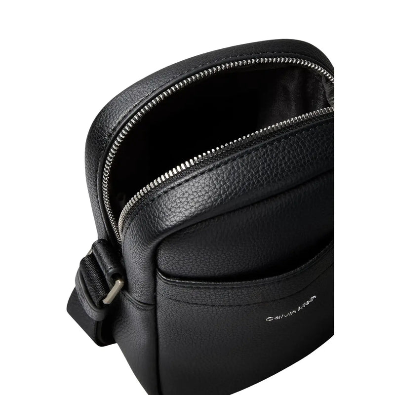 Calvin Klein Sac bandoulière homme en cuir polyuréthane texturé noir avec fermeture éclair argentée et bandoulière ajustable