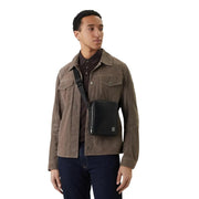 Calvin Klein Sac bandoulière homme en polyuréthane noir, design minimaliste et logo discret sur le devant, dimensions : 17 x 21 x 7 cm