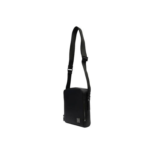 Sac bandoulière Calvin Klein pour homme, en polyuréthane noir, au design minimaliste et élégant, avec bandoulière ajustable.