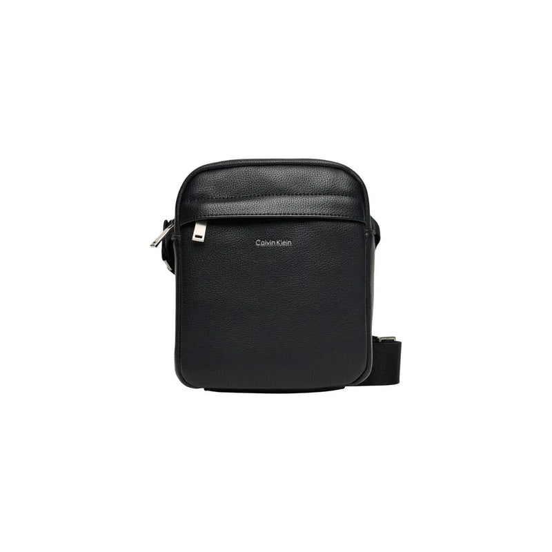 Noir Calvin Klein Sac bandoulière homme en cuir texturé avec poches zippées argentées, dimensions 18 x 23 x 7 cm