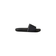 Pantoufles Calvin Klein noires pour homme, sandales à enfiler en polyuréthane, design minimaliste et élégant, logo blanc sur la bride