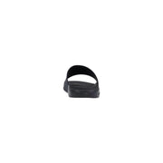 Pantoufles Calvin Klein pour homme, sandales à enfiler en polyuréthane noir au design minimaliste et épuré.