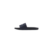 Calvin Klein Sandales à enfiler pour homme en polyuréthane noir, au design minimaliste et au logo discret sur la bride.