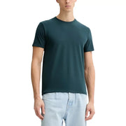 T-shirt en coton bleu sarcelle foncé à col rond t-shirt avec un logo brodé discret sur la poitrine gauche par Calvin Klein collection homme
