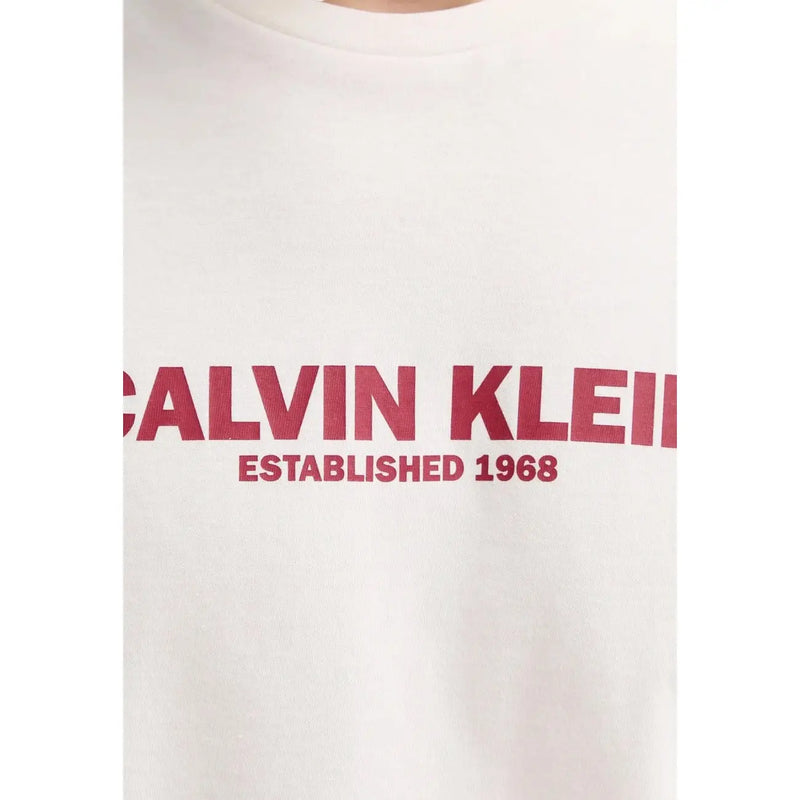 White Calvin Klein men t-shirt with bold red Calvin Klein and established 1968 lettering across the chest