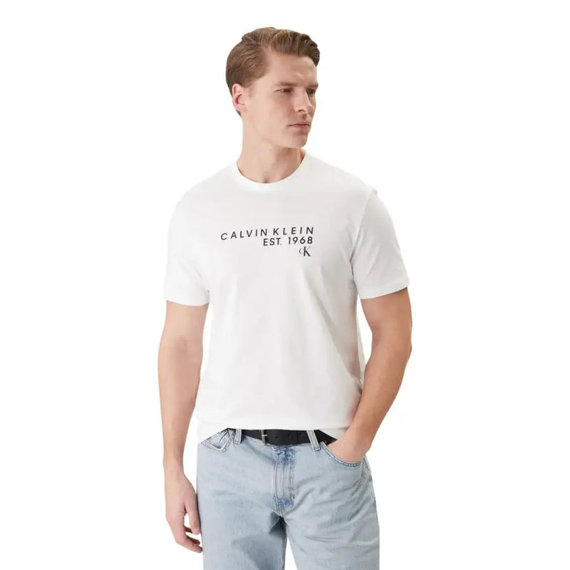 T-shirt Calvin Klein blanc pour homme, imprimé Calvin Klein noir, 100% coton, col rond, manches courtes, taille 30 (EU).