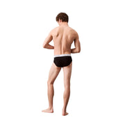 Calvin Klein men underwear black briefs with white logo waistband made from comfortable fabric for daily wear