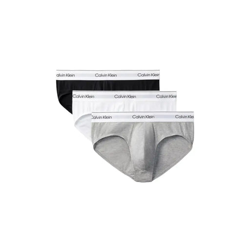 Calvin Klein Slips pour hommes, disponibles en noir, blanc et gris chiné, avec ceinture élastique signature.