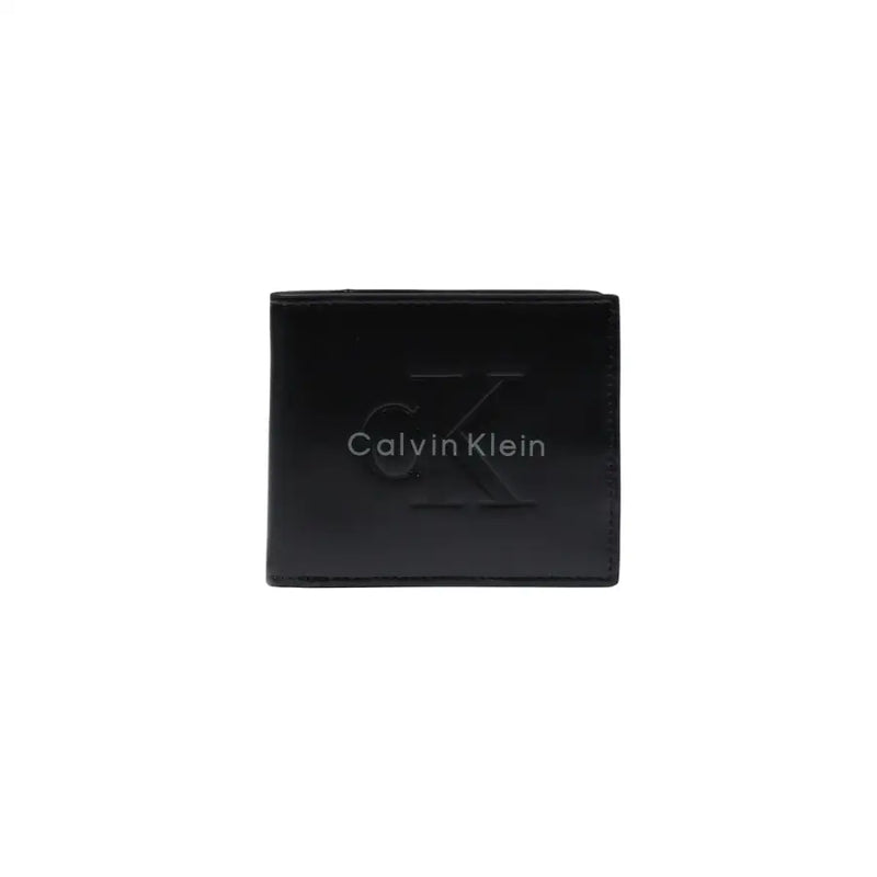 Portefeuille homme Calvin Klein noir avec logo embossé élégant et finition cuir lisse visible sur le devant