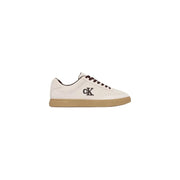 Calvin Klein baskets basses sportives en daim blanc pour hommestop Baskets à lacets noirs, semelle en caoutchouc beige et logo CK sur le côté