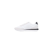 Calvin Klein Baskets montantes blanches en textile pour homme, avec empiècements noirs au talon et sur la semelle intermédiaire, dans un style minimaliste.