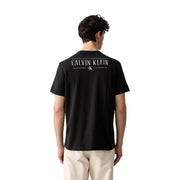 T-shirt Calvin Klein pour homme, en coton noir, coupe classique, dos visible avec logo Calvin Klein blanc et monogramme CK imprimés.