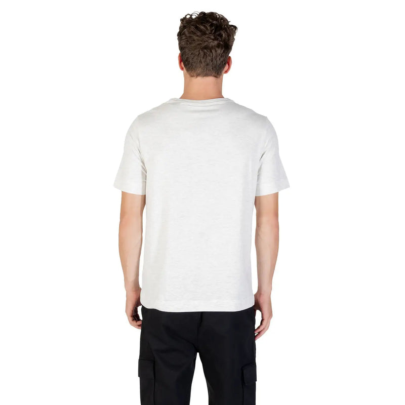 T-shirt blanc en coton à col rond t-shirt avec manches courtes, étiquette visible sur le devant Calvin Klein Sport T-shirt gris en mélange de coton pour homme