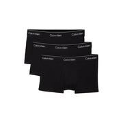 Boxers noirs Calvin Klein avec liseré logo blanc, conçus pour les hommes et offrant un confort optimal au quotidien.