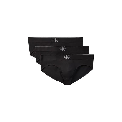 Noir Calvin Klein Slip pour homme au design minimaliste et élégant, orné d'un logo blanc discret sur la ceinture, idéal au quotidien.