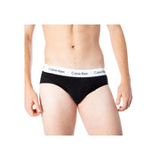 Noir Calvin Klein Slip pour homme avec une ceinture élastique blanche ornée du logo répété de la marque en tissu de coton