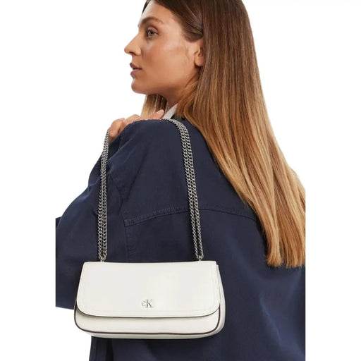 Calvin Klein white leather crossbody bag with silver chain strap spring summer shoulder bag with pocket