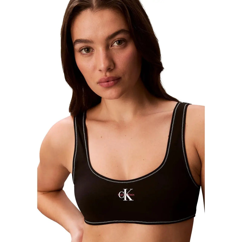 Black Calvin Klein bralette with white stitching and small embroidered logo for women beachwear light blue collection