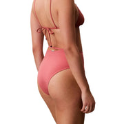 Calvin Klein women beachwear coral-pink nylon high-waisted bikini bottom with thin straps and tied-back design back view